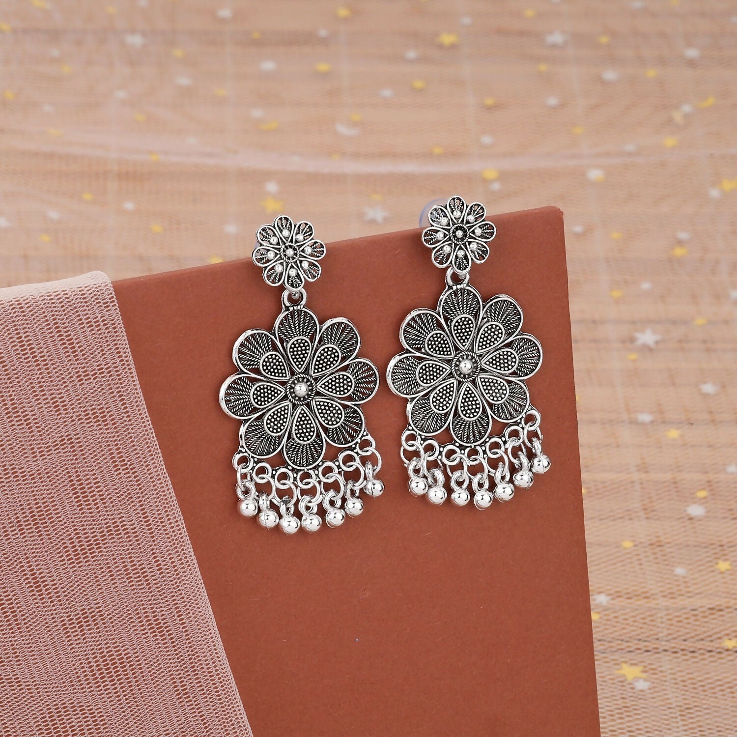 Elegant Oxidised Silver Jhumka Earings With Layered Floral Design 1 Elegant Oxidised Silver Jhumka Earings With Layered Floral Design