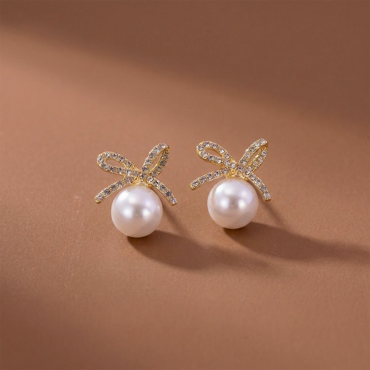 Elegant Pearl Bow Stud Earrings for Women And Girls 3 Elegant Pearl Bow Stud Earrings for Women And Girls - Image 3