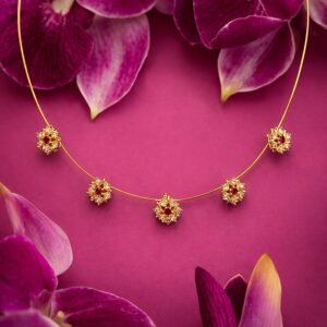 Ruby Blossom Floral Necklace Elegant Golden Petal Design Stylish Chain Jewelry